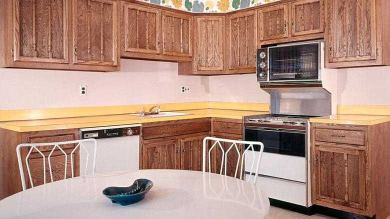A '70s era kitchen with yellow laminate countertops