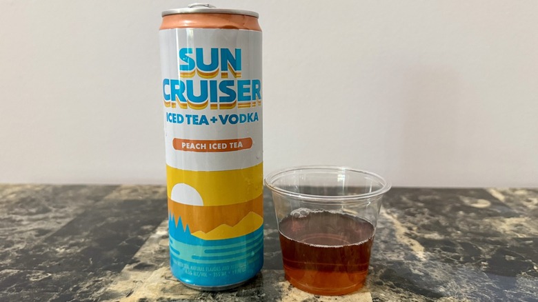 Can and poured sample of Peach Iced Tea Sun Cruiser