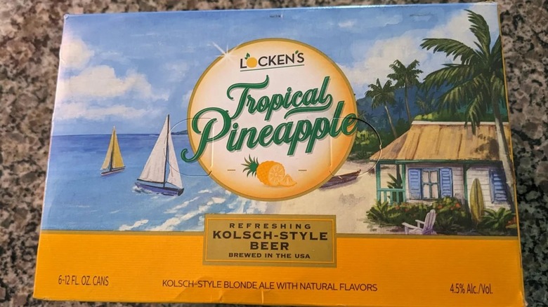 Case of Locken's Tropical Pineapple Kölsch-Style Beer on kitchen counter