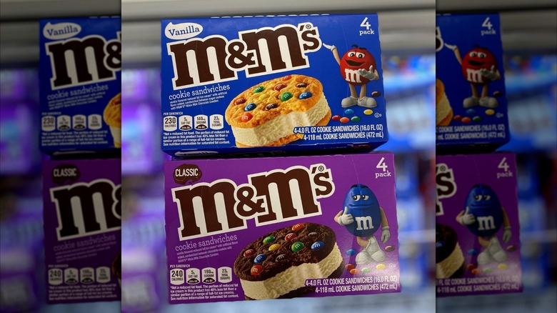 a box of M&M's vanilla and one of chocolate ice cream cookie sandwiches