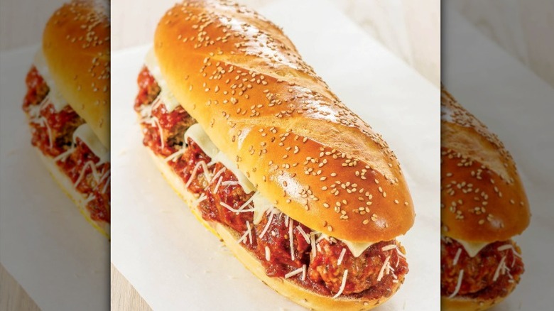 A large meatball sub from DiBella's sits on a paper wrapper
