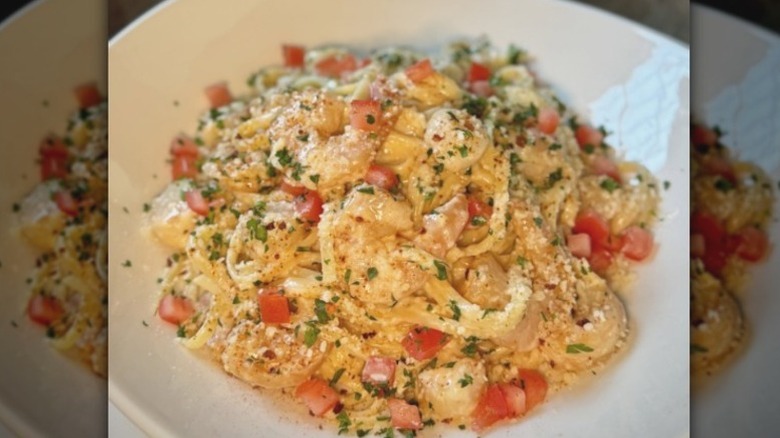 A plate of Scallops and Shrimp Scampi Pasta at Bonefish Grill