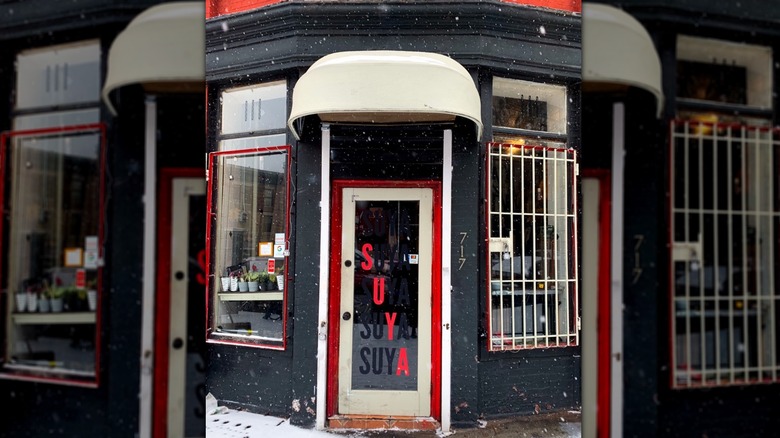 black and red storefront of Brooklyn Suya