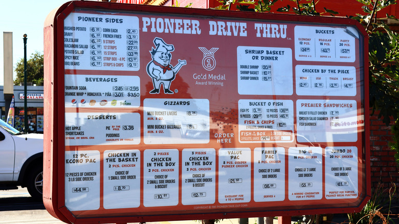 A Pioneer Chicken drive-thru menu.