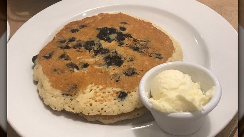 Blueberry pancakes on a white plate at Cracker Barrel