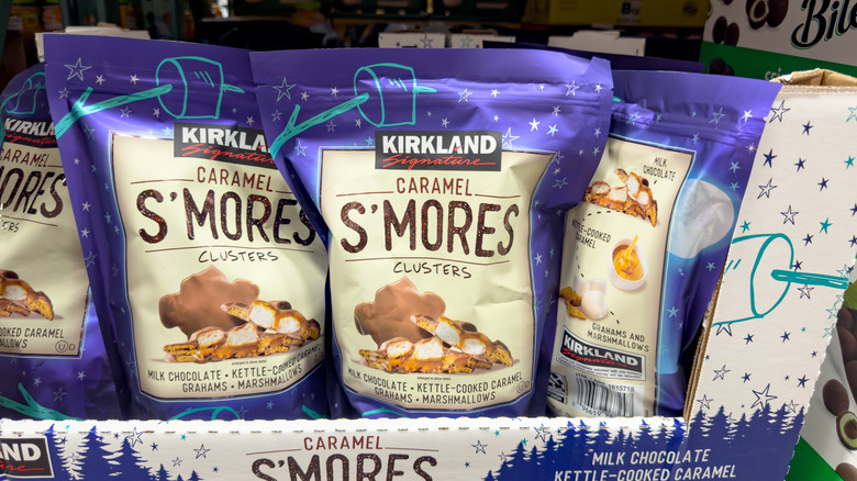 Bags of Costco Caramel S'mores Clusters sit in a display case