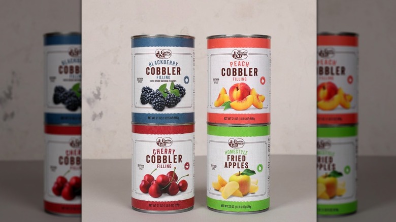Stacked cans of Cracker Barrel cobbler filling