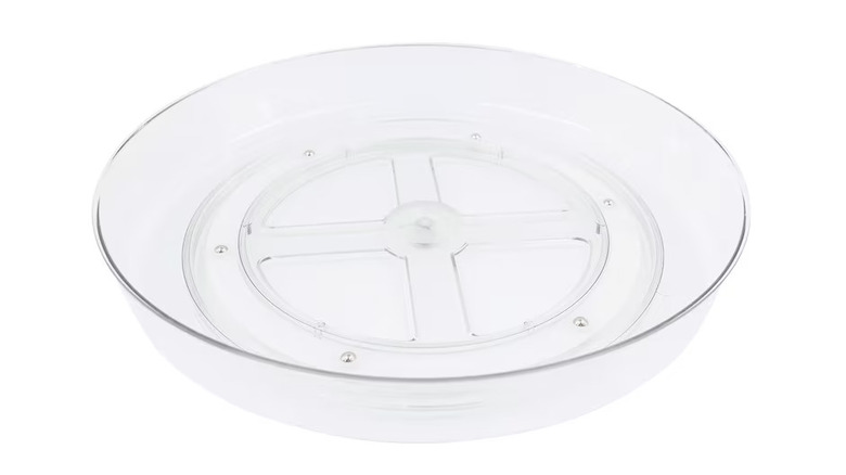 A clear, plastic turntable for organizing small items