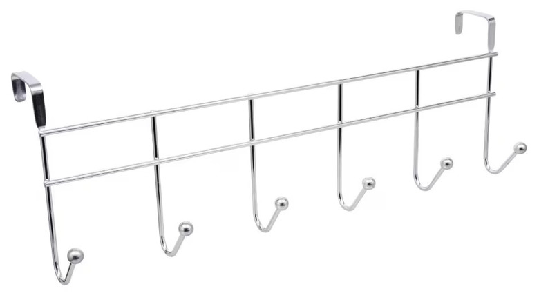A silver over-the-door hanging rack with six hooks