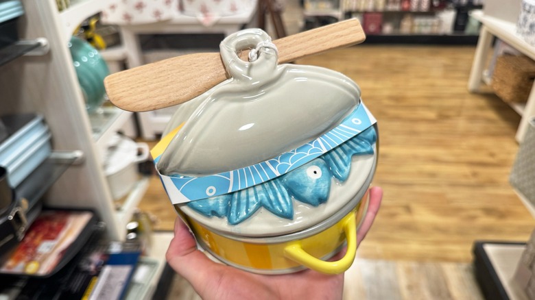 A brie cheese baker shaped like a can of sardines