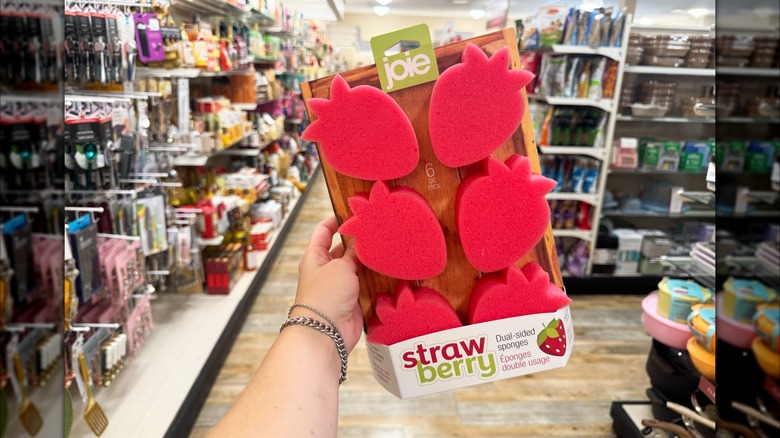 A pack of six strawberry-shaped dual-sided sponges