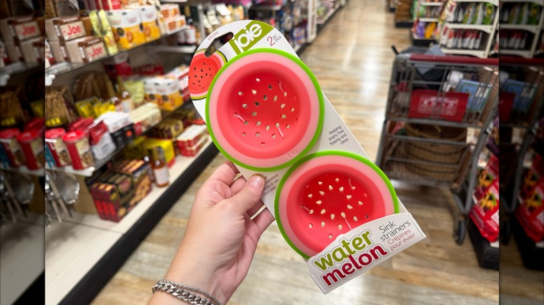 A pack of two watermelon colored silicone sink strainers