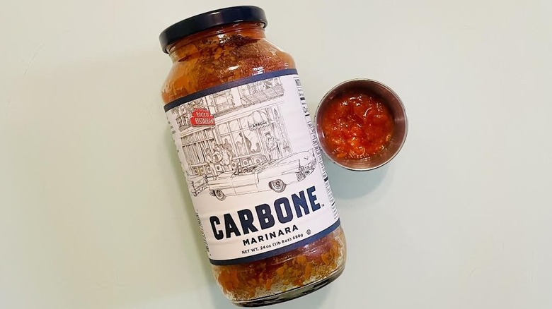Jar and ramekin of Carbone Marinara Sauce