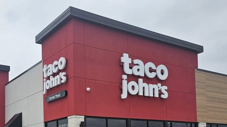 White Taco John's logo on a red building