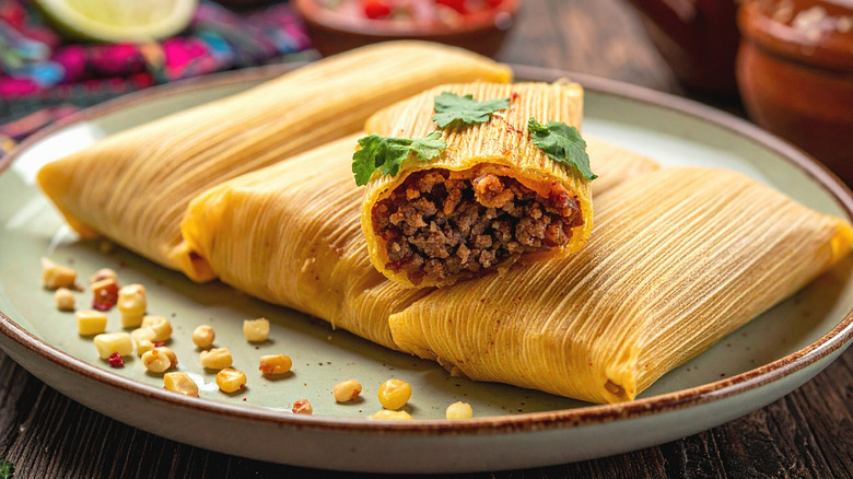 Plate of meat and corn tamales