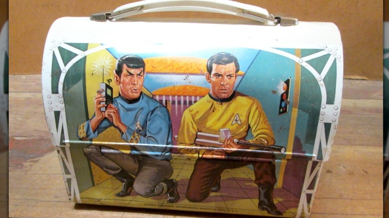 Dome topped Star Trek themed lunch box featuring Captain Kirk and Mr. Spock