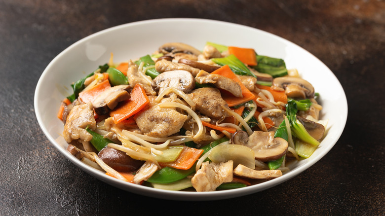 Chop suey on a white plate
