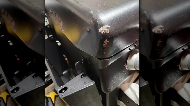 Closeup of a dented and damaged Blackstone Griddle