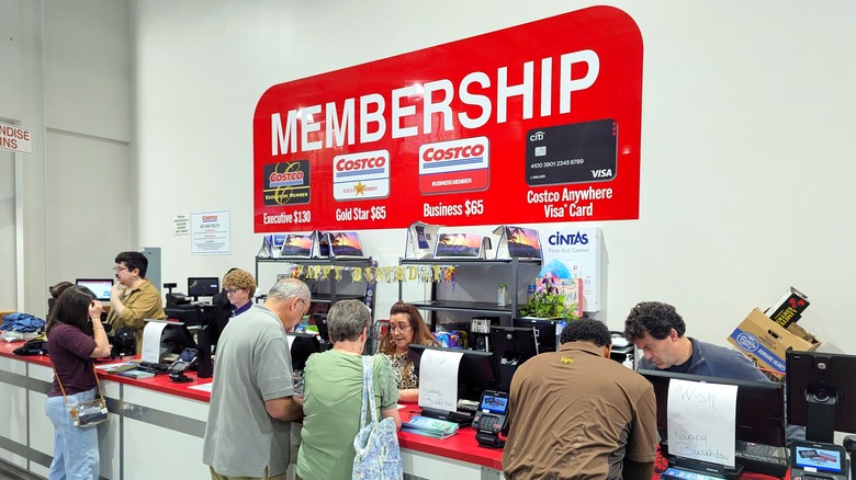Costco employees field concerns at the membership desk