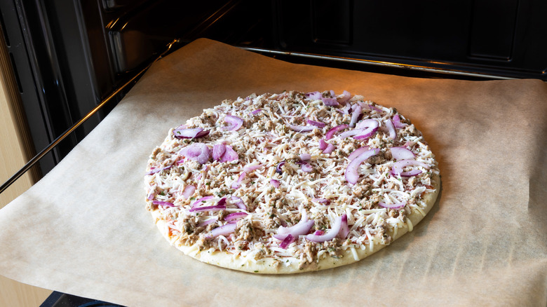 Frozen pizza on a baking sheet