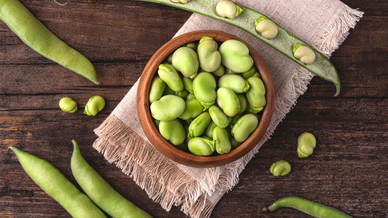 fava beans in wooden bowl