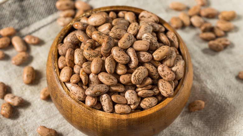 wooden bowl of pinto beans