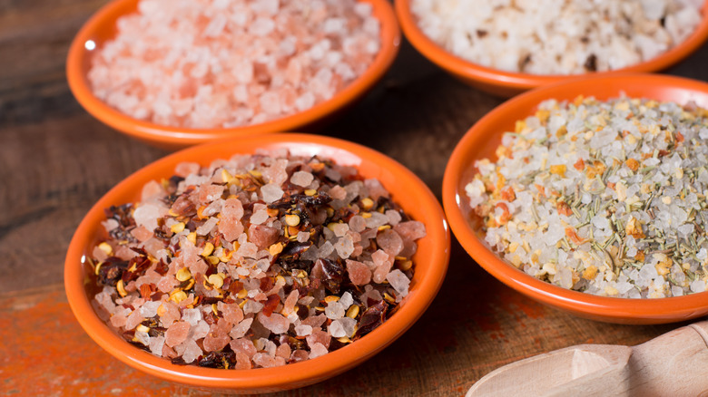 Various salts in orange bowls