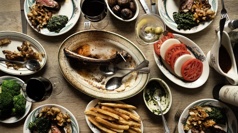 Finished steak bones on a plate at Peter Luger Steak House