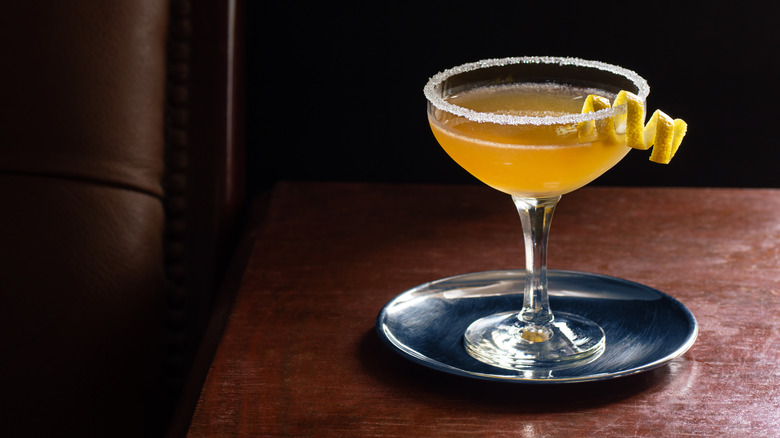 Cocktail with lemon twist garnish