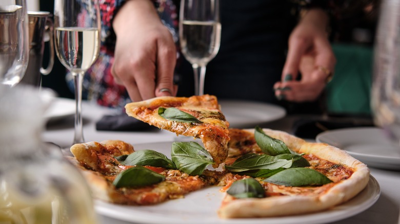 Champagne served with margherita pizza