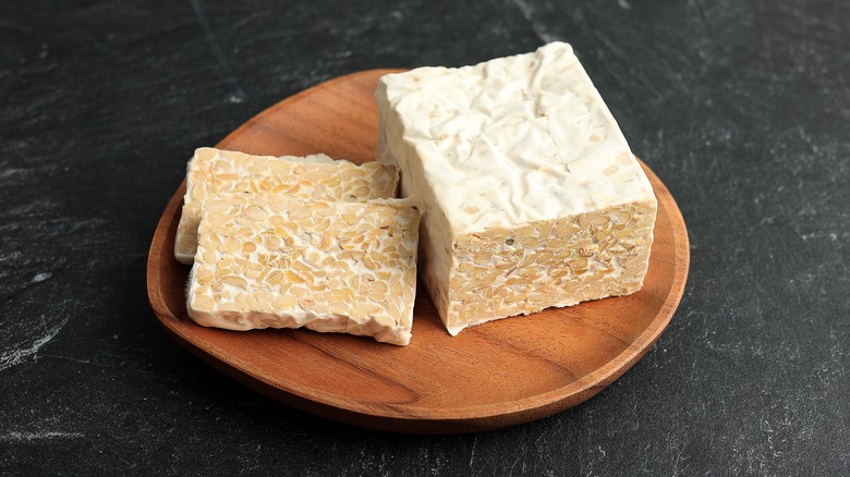 Block and slices of raw tempeh
