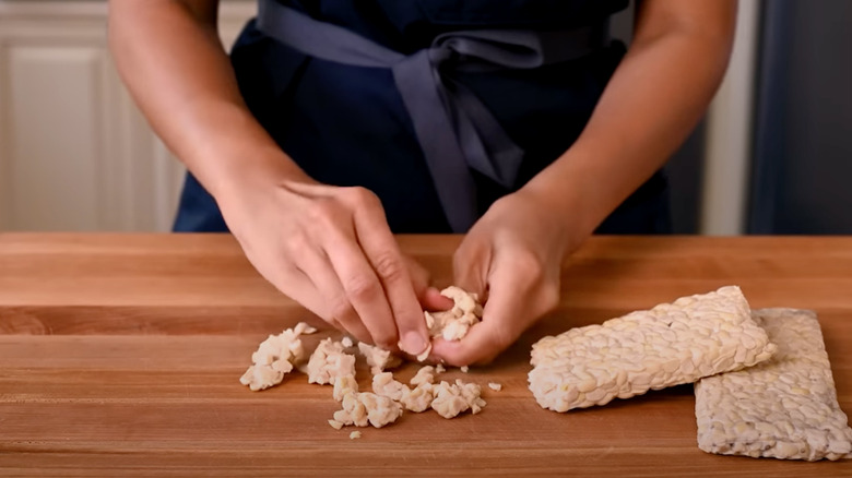 Crumbling tempeh by hand