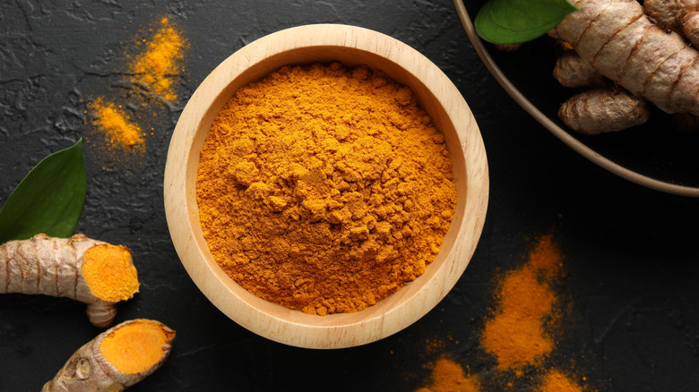 A bowl of turmeric powder.