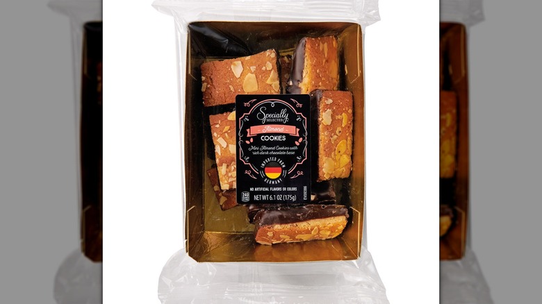 A package of almond cookies sits against a white background