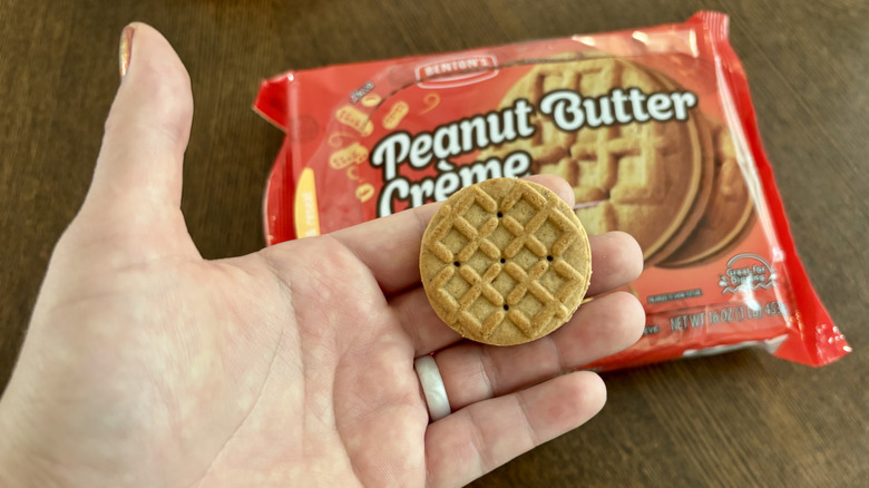 Holding Benton's Peanut Butter Crème Sandwich Cookies