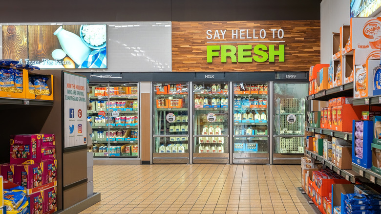 interior shot of dairy section at aldi