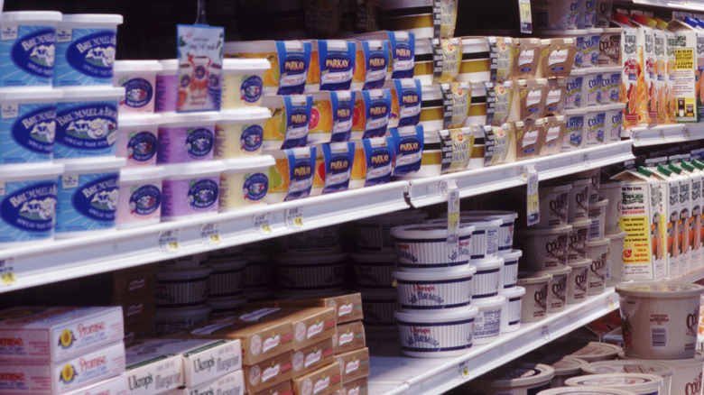 various butter brands on store shelves