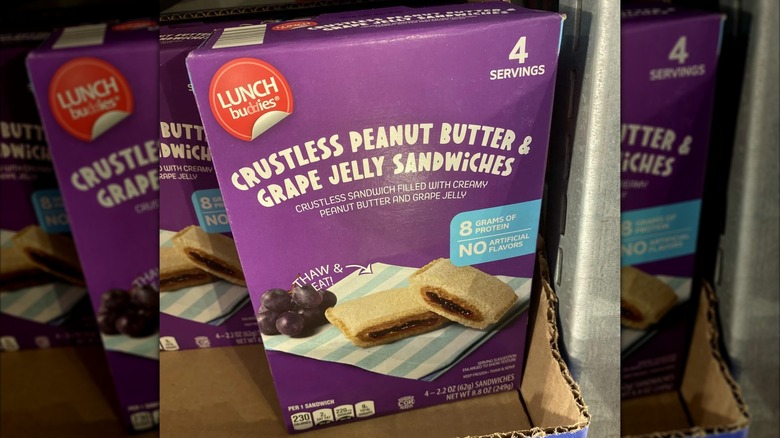 Cross section of a crustless grape jelly and peanut butter sandwich