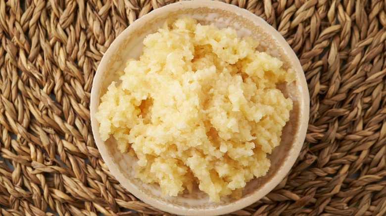 A bowl of minced garlic