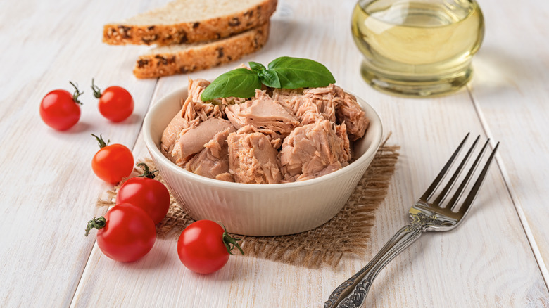 chunks of canned tuna in a white bowl