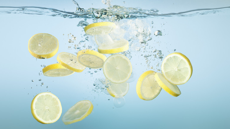 fresh lemons on white background