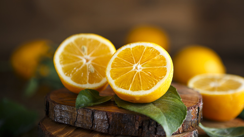 meyer lemons on wood board