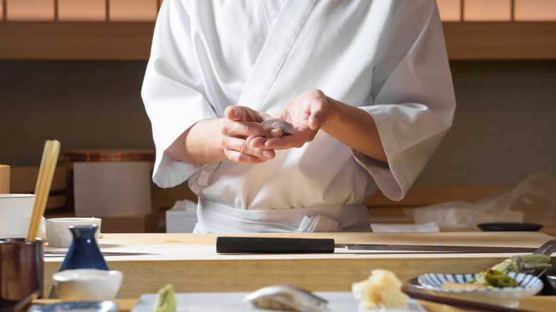 chef preparing omakase meal