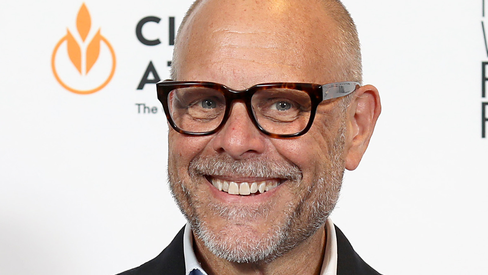 Alton Brown's Party Baked Alaska Involves A Ridiculously Large Torch