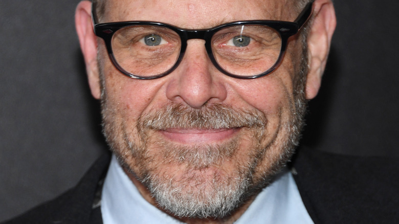 Alton Brown in glasses smiling