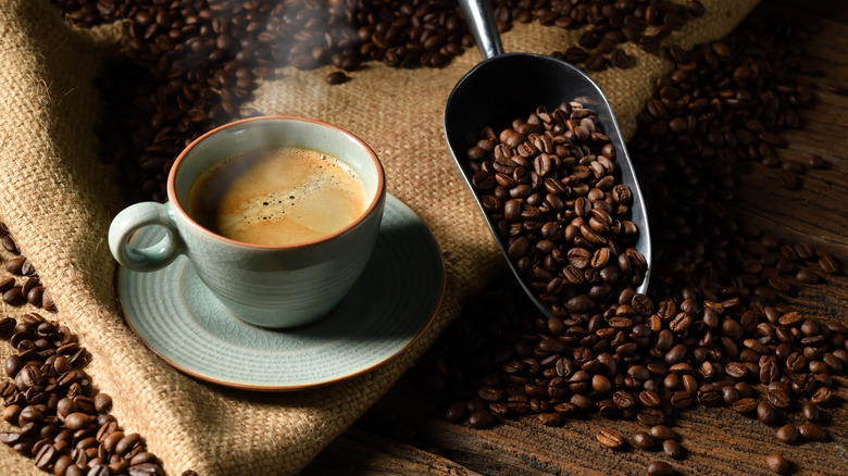 cup of coffee and coffee grounds