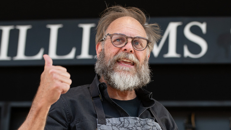 Alton Brown gestures on the 2024 Williams Sonoma Culinary Stage in Napa Valley