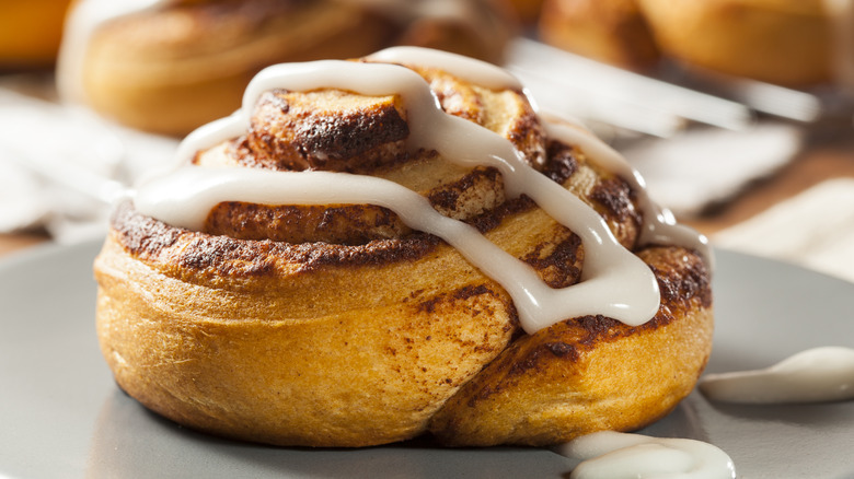 A classic cinnamon roll with icing.