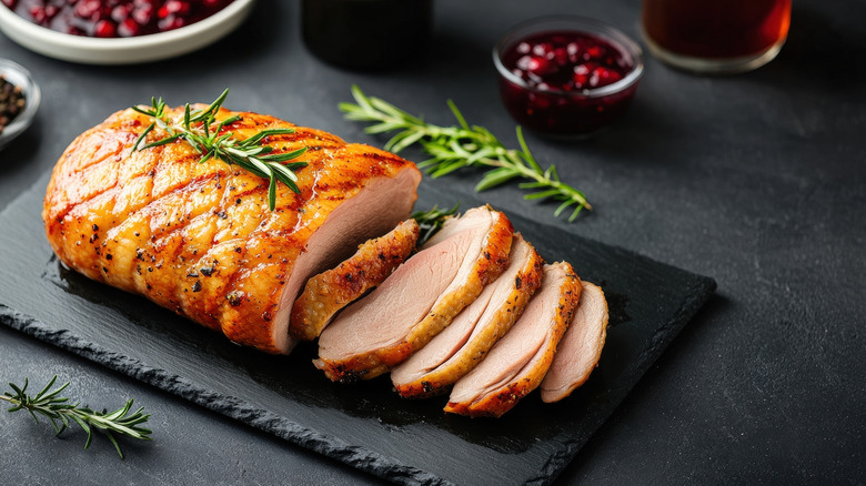 Pork roast topped with rosemary