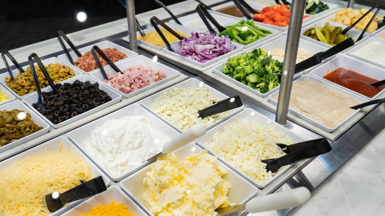 Ingredients sit in a salad bar at a Golden Corral restaurant.